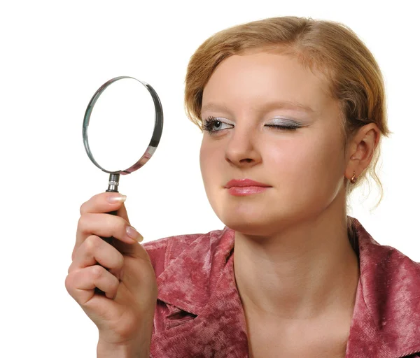 The girl with a magnifier — Stock Photo, Image