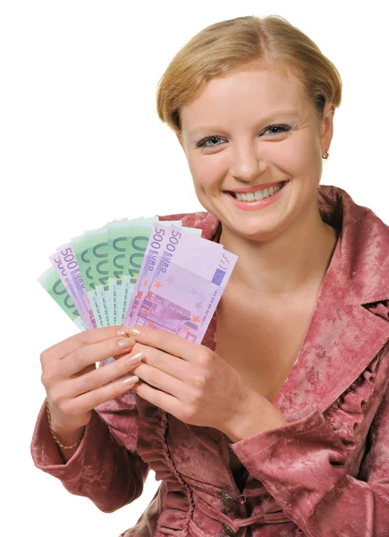 Молодая женщина держит валюту — стоковое фото