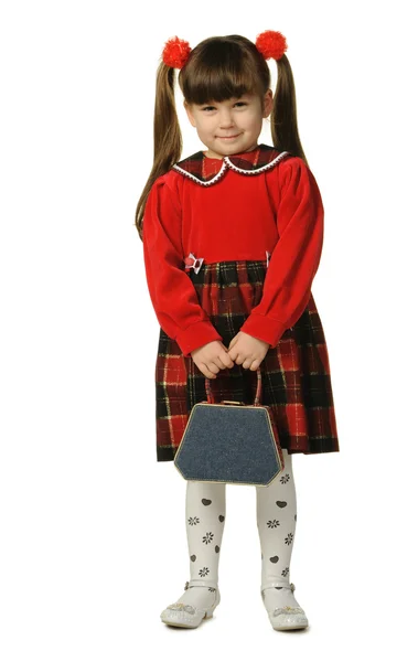 Das kleine Mädchen im roten Kleid — Stockfoto