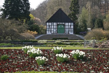 Timbered house with flowers in Germany clipart