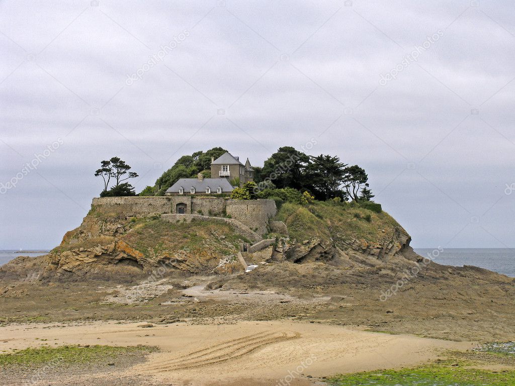 Isle with castle at low tide, Brittany
