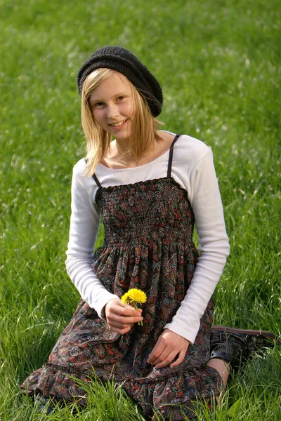 Blonde girl in the grass — Stock Photo, Image