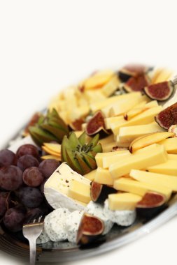 Cheese plate with grapes clipart