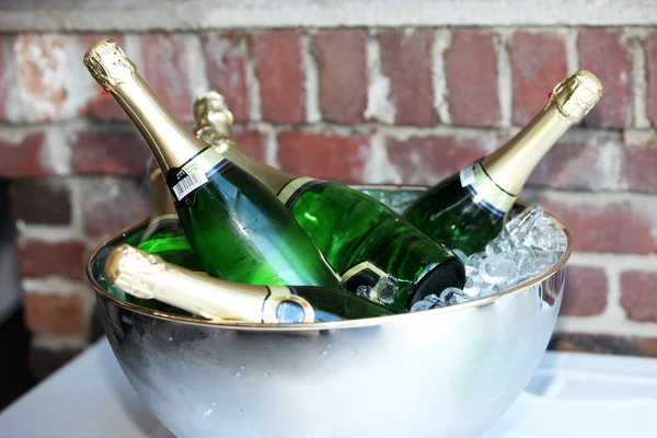 Bottles of champagne in a champagne — Stock Photo, Image