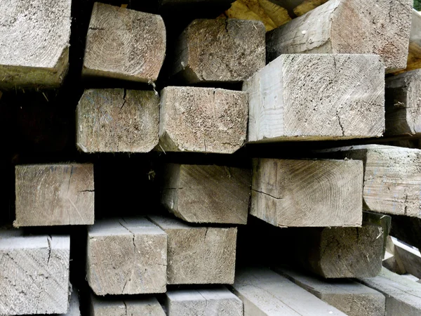 Closeup of a pile of wood with beams — Stock Photo, Image
