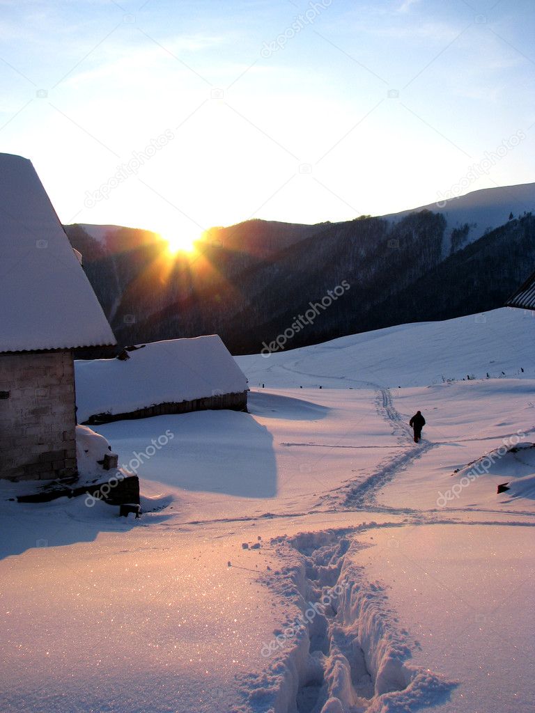 Winter evening in the mountainous villag