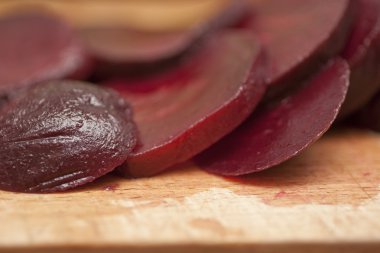 Freshly cut slices of beetroots clipart