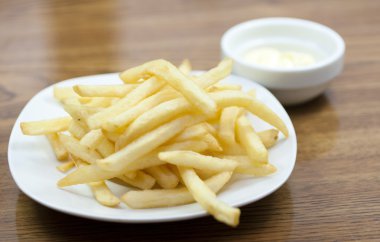 Pommes frites with mayonnaise clipart
