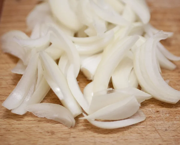 stock image Freshly cut slices of onions