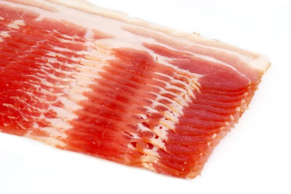 Uzené plátky slaniny — Stock fotografie