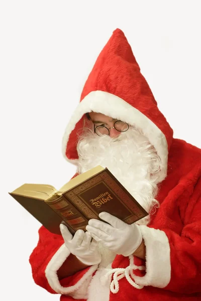 圣诞老人与圣经 — 图库照片