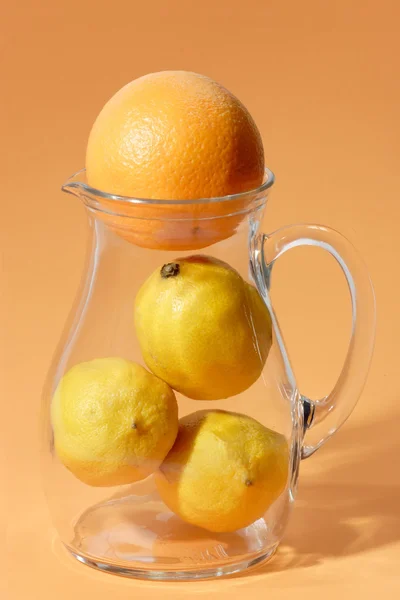 Fruits in a glass jug — Stock Photo, Image