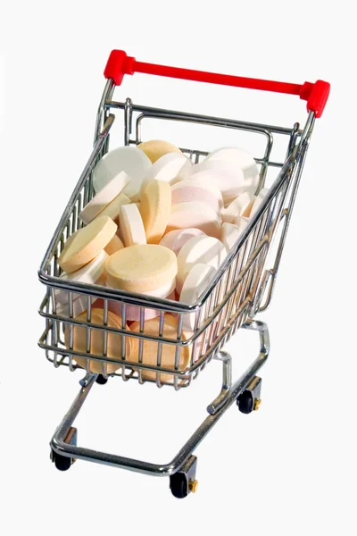 Vitaminen in een model trolley — Stockfoto
