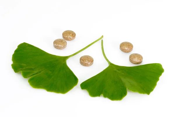 Leaves and pills — Stock Photo, Image