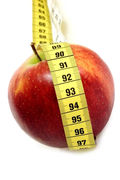 Apple with tape measure — Stock Photo, Image
