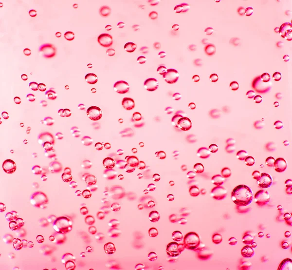 Прозорий бульбашки в червоний гель — стокове фото