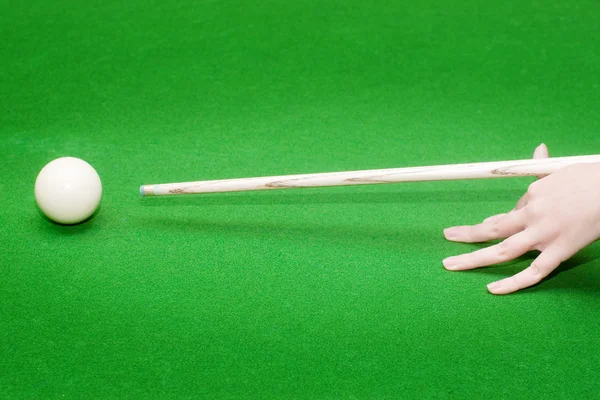 Hand ready to strike white pool ball — Stock Photo, Image