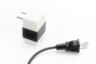 American type power cable plugged into white voltage converter clipart