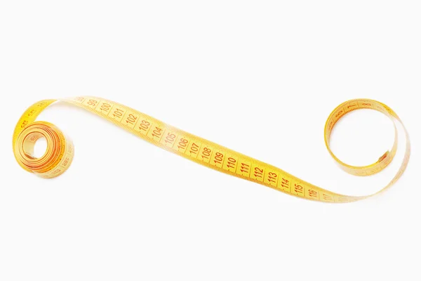 Rolled on both ends yellow measuring tape line — Stock Photo, Image