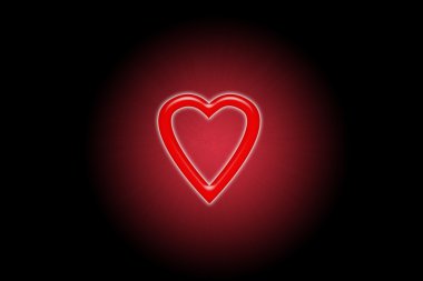 Bulanık bir dairede karanlıkta parlayan kırmızı kalp