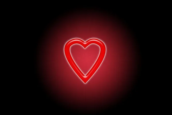 Rotes Herz glüht im Dunkeln in verschwommenem Kreis — Stockfoto