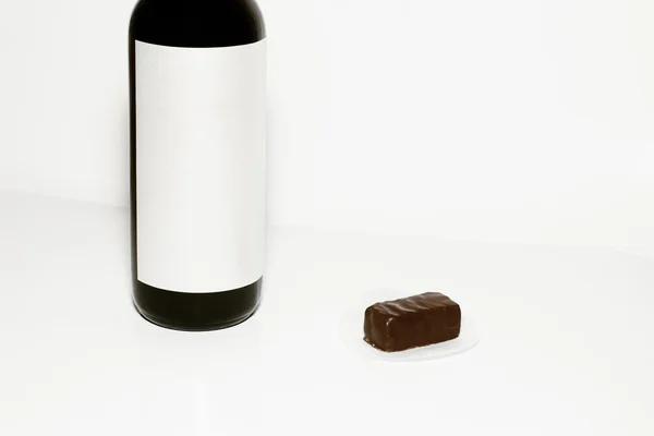 Stock image Wine bottle and chocolate candy