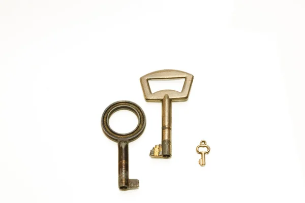 Три прикрашені старі ключі — стокове фото