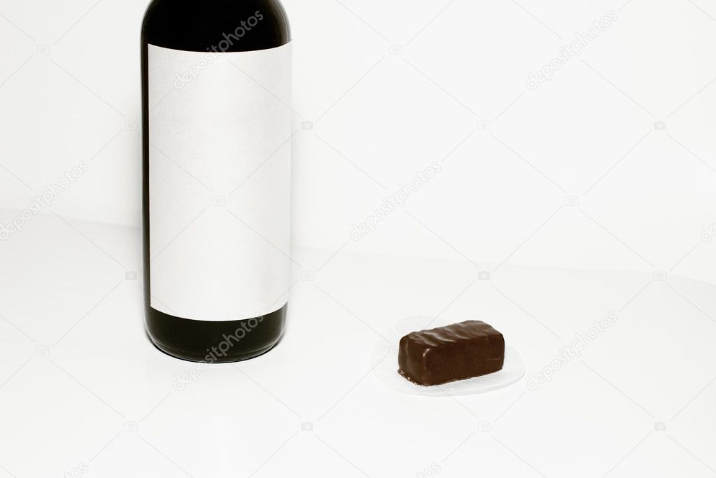 Wine bottle and chocolate candy