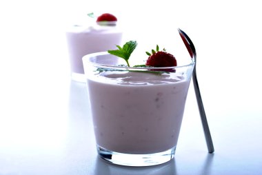 Strawberries in natural yogurt clipart