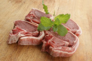 Organic raw lamb chops clipart