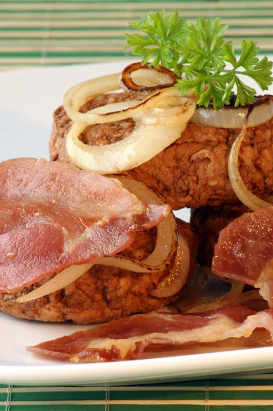 Rissole with grilled bacon — Stock Photo, Image