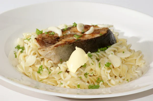 Pasta with grilled salmon steak — Stock Photo, Image