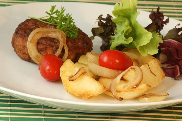Rissole with grilled potato — Stock Photo, Image