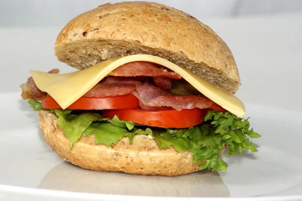 Bacon burger on a plate — Stock Photo, Image