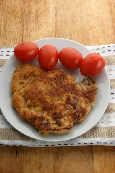 Cutlet with organic tomato — Stock Photo, Image