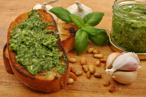 Baguette as a snack with pesto — Stock Photo, Image