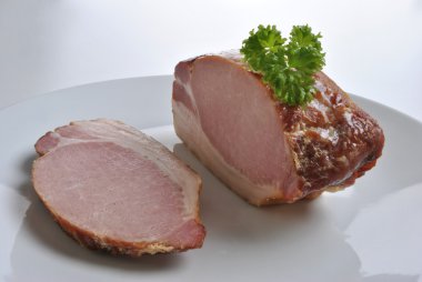 Cooked organic back bacon joint clipart