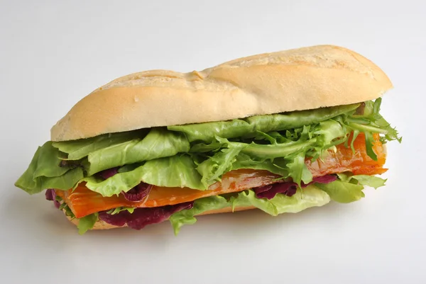 Bread roll with organic smoked salmon — Stock Photo, Image