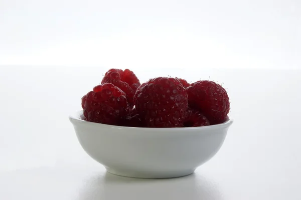 Some sweet organic raspberries — Stock Photo, Image