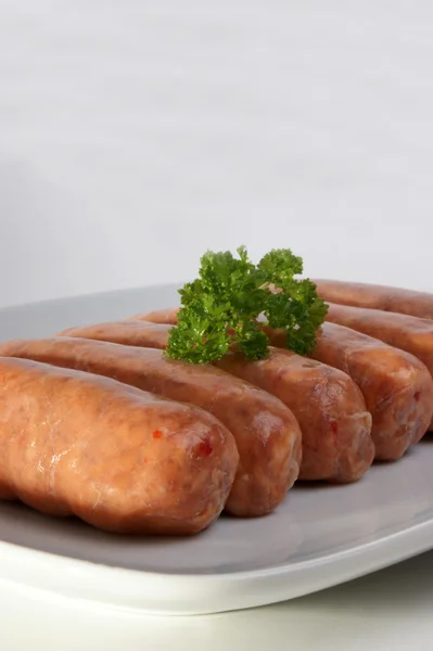 Some organic pork sausages — Stock Photo, Image