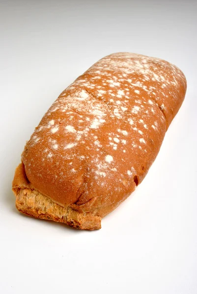 Fresh farmers loaf on a white background — Stock Photo, Image
