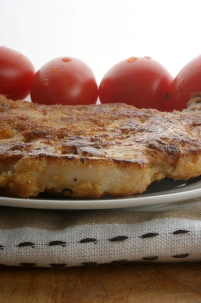 One pork cutlet and tomato — Stock Photo, Image