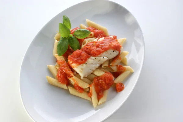 stock image Cod loins with tomato sauce