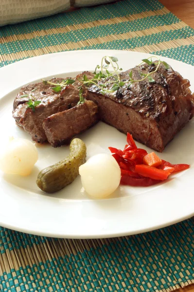 Grilled rump steak with sour vegetable — Stock Photo, Image