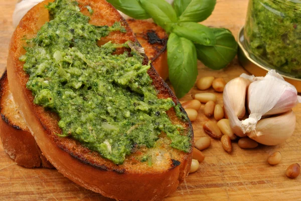 Baguette as a snack pesto — Stock Photo, Image