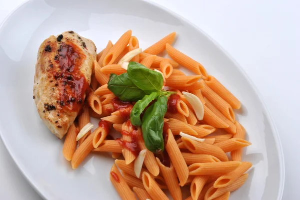 Pasta with grilled turkey breast — Stock Photo, Image