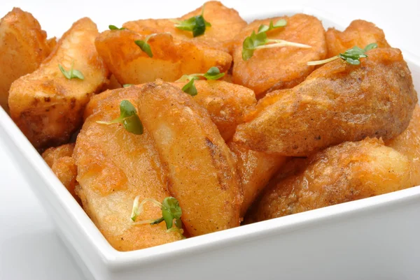 Some fried potato wedges — Stockfoto