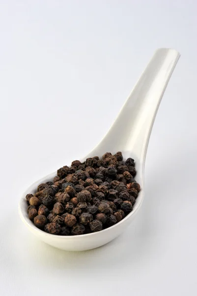 Black organic pepper — Stock Photo, Image