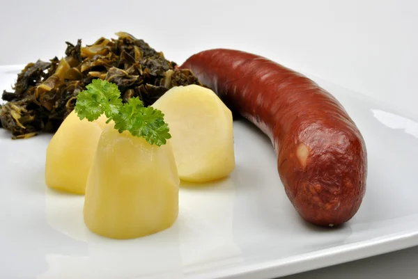 Smoked sausage with potato — Stock Photo, Image