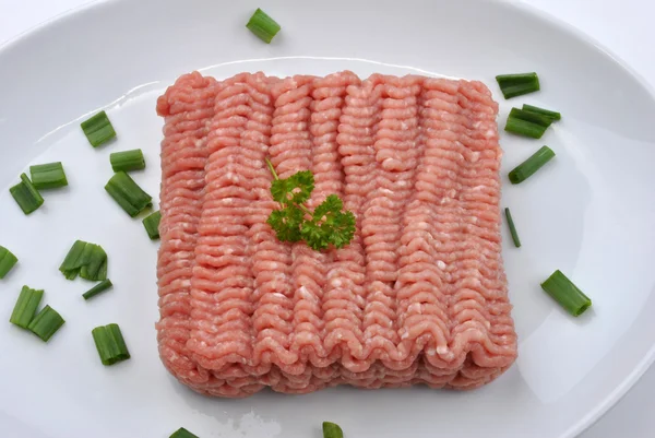 Minced meat with parsley — Stock Photo, Image